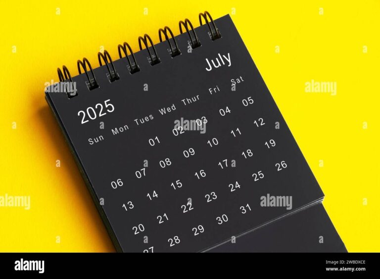 July 2025 Black And White Desk Calendar On Yellow Cover Background Calendar Concept Stock Photo Alamy